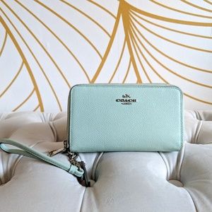 ON SALE Coach leather accordion zip wallet in mint